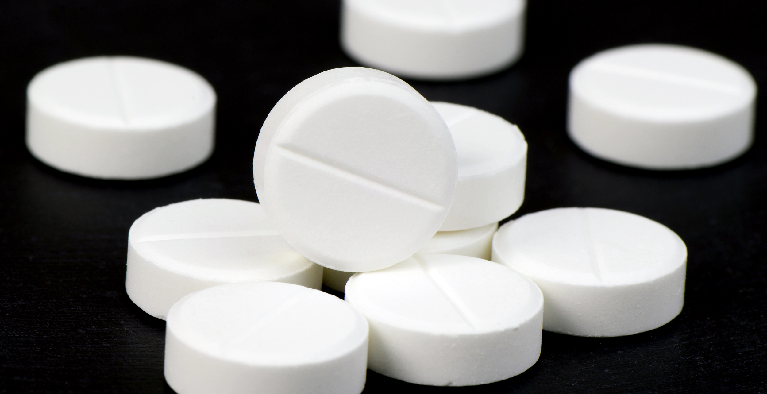 opioid pills piled up