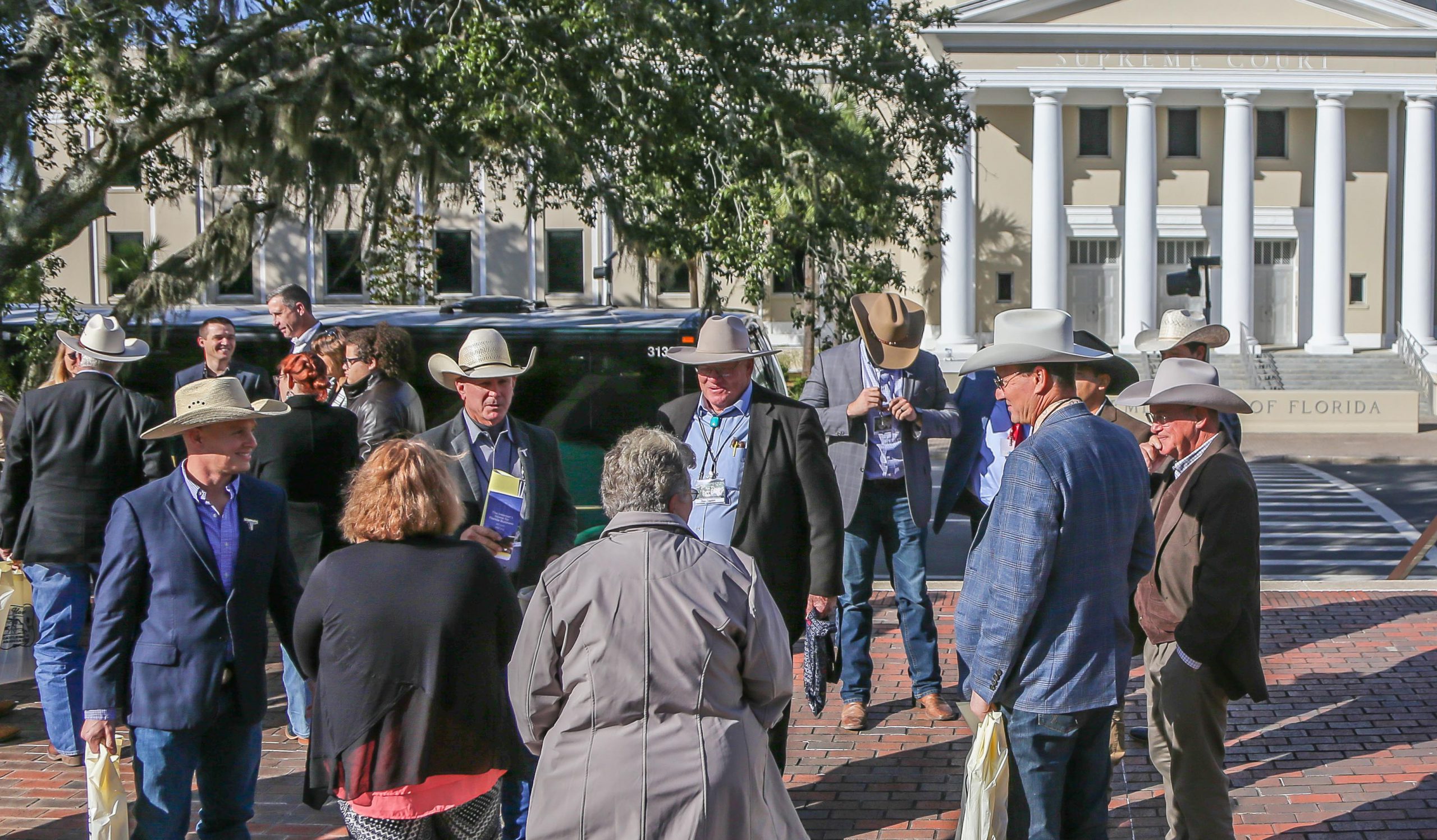 Men in cowboy hats outside Florida Capitol Complex