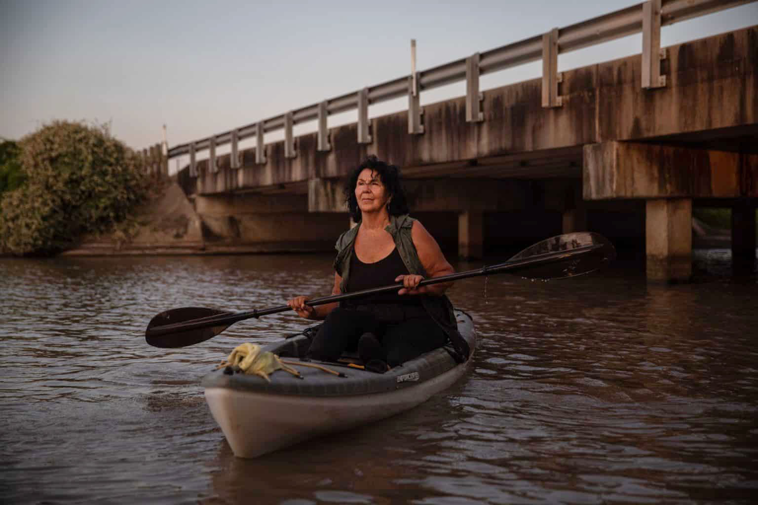 Diane Wilson investigating microplastic pollution on Cox’s Creek in the Texas Gulf Coast town of Point Comfort. She led a group of local residents in a successful courtroom assault on giant Formosa Plastics. (Tamir Kalifa)