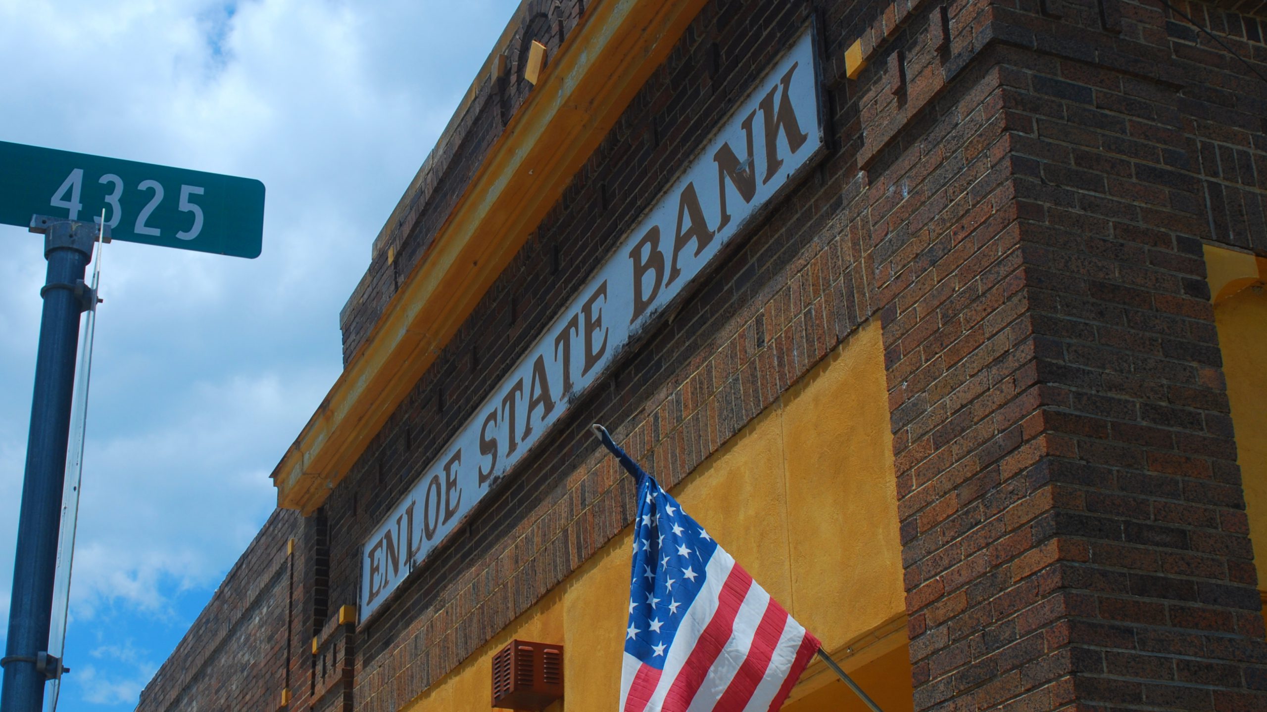 bank building with old sign