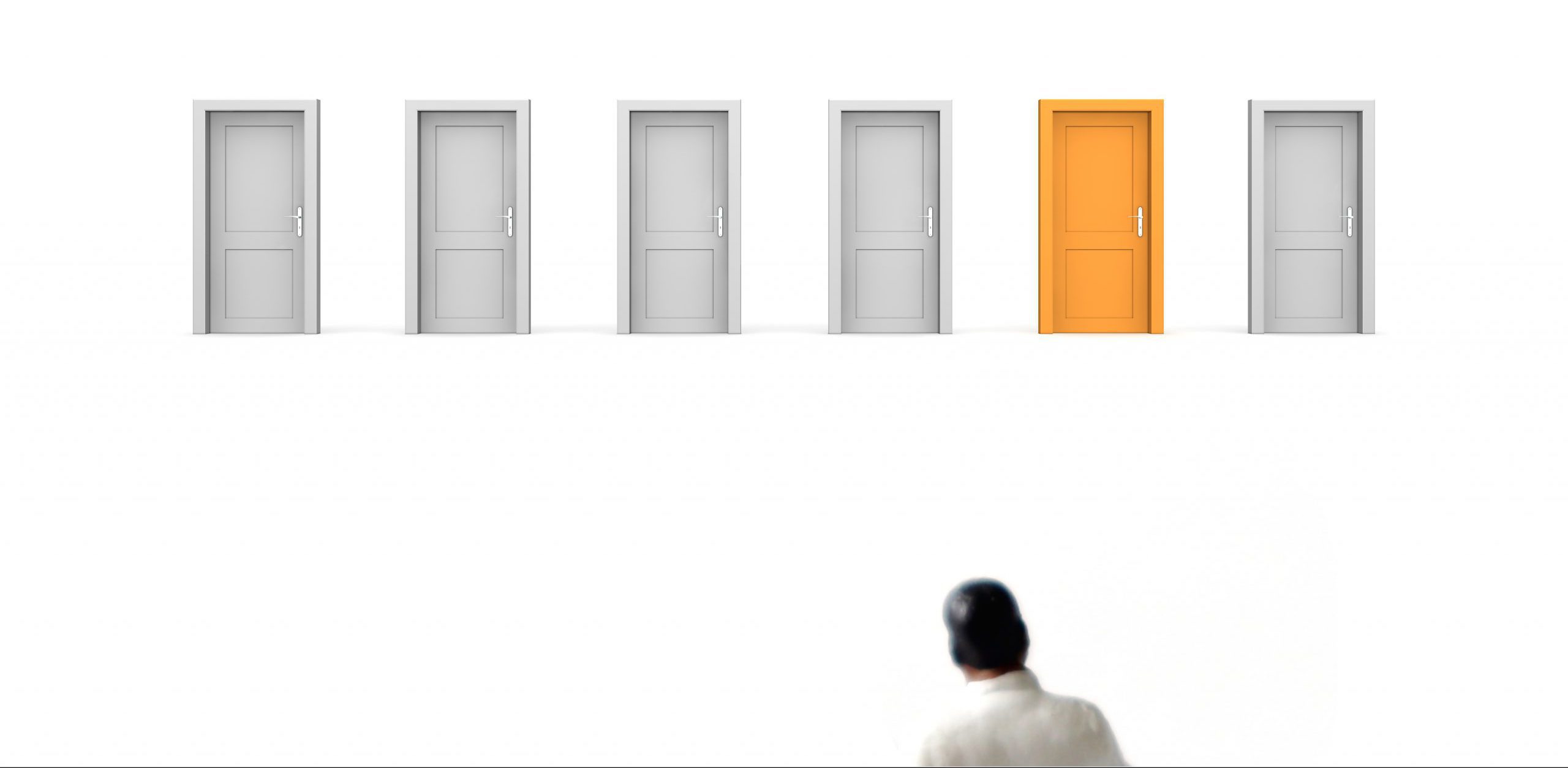 Man standing in front of closed doors
